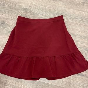 Woman’s JCrew Maroon stretch skirt.
